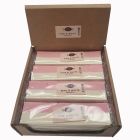 A wholesale case of pink and white chewy nougat bars